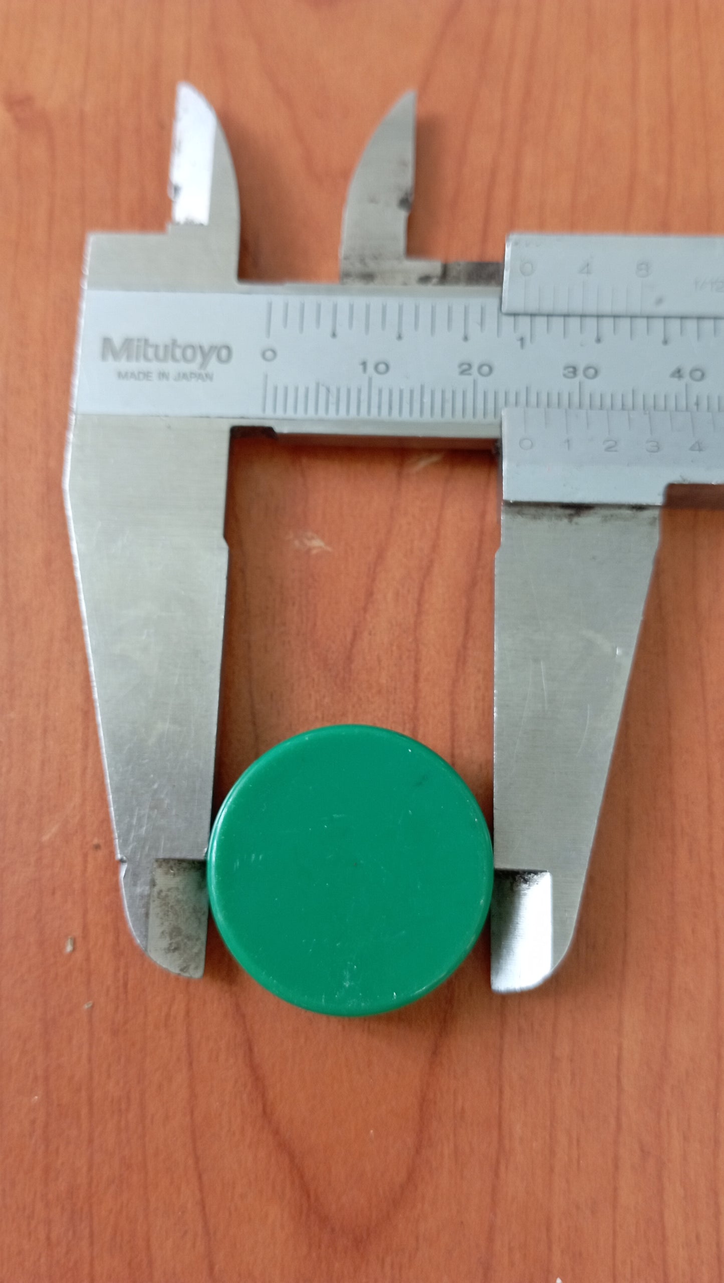 Bottone verde, senza guardia marchio CEMA